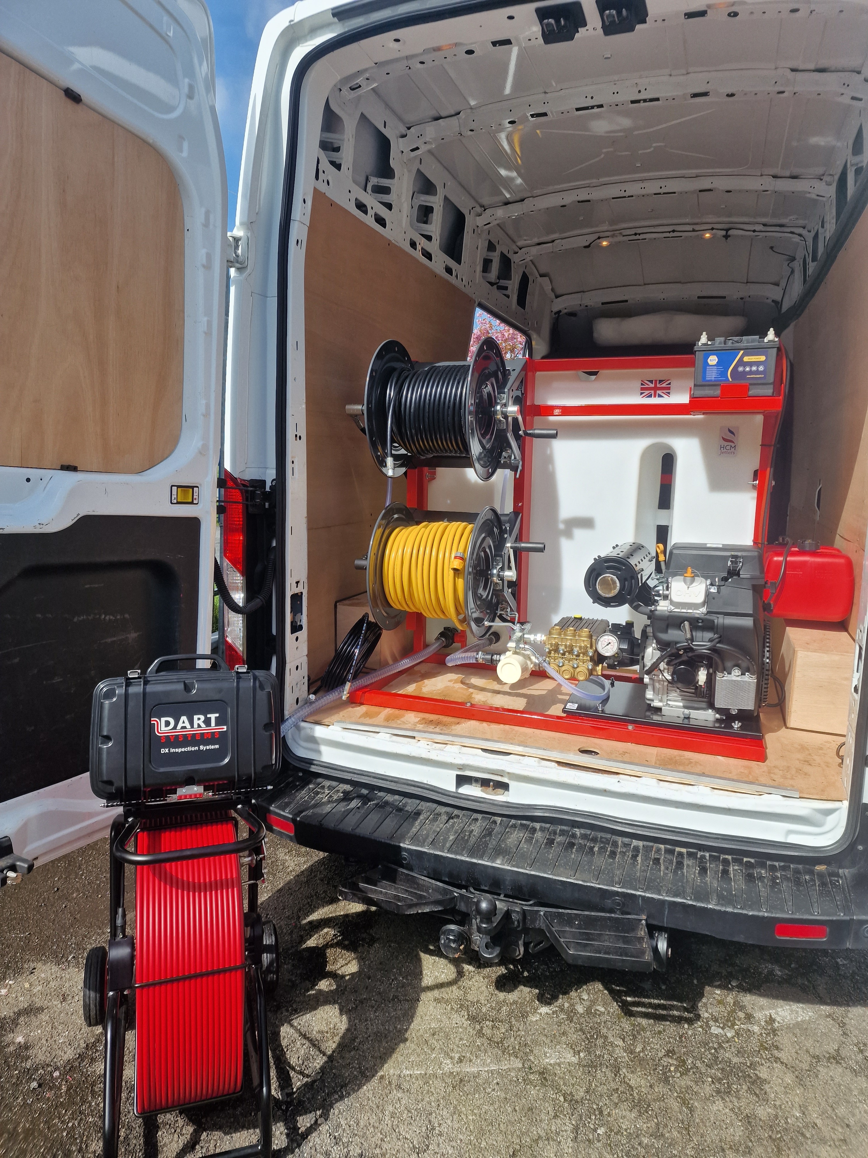 large image of a hcm high pressure drain jetting unit vanpack system fitted into the back of a white drainage van with cctv drain cameras as a package deal for new start up businesses or established businesses looking to upgrade.